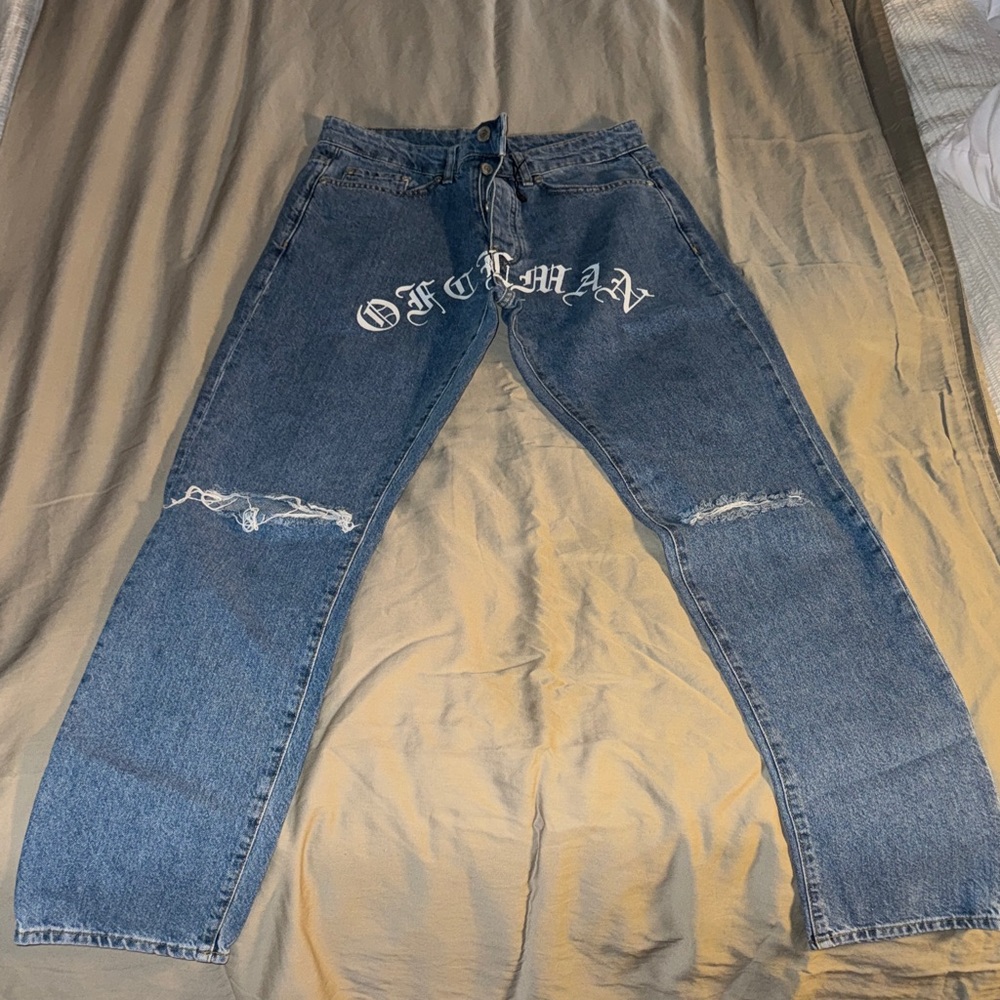 Men's Blue Relaxed Jeans with White Script Detail
